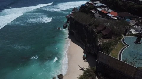 Beautiful Beach Down Steep Cliffs [Drone Footage] Stock Footage 96106612