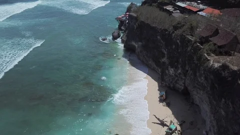 Beautiful Beach Down Steep Cliffs [Drone Footage] Stock Footage 96106744