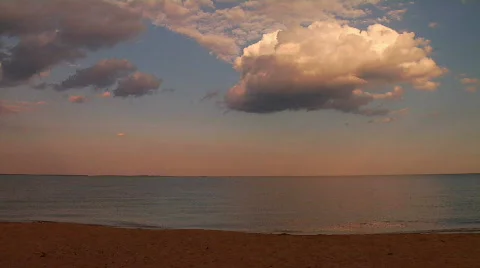 Beautiful Beach with Red Sunset Clouds Stock Footage 302872