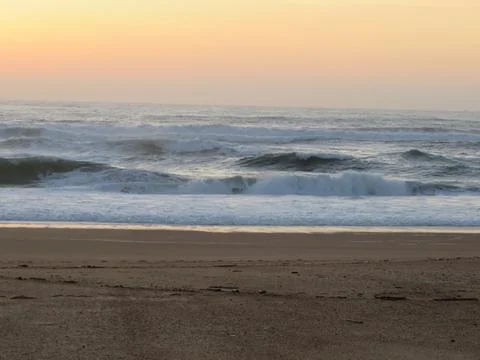 Beautiful beach with the sea and its heat waves sun sky water salt air Stock-Fotos