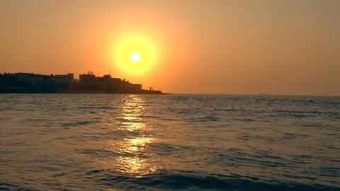 Beautiful Beach Sunset Backlight Silhouette with Glowing Sky 4K Stock Footage 319926468