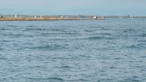 Beautiful beach as waves crash down in winter Stock Footage 117409557