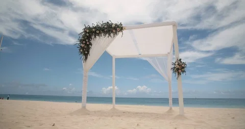 Beautiful Beach Wedding Tent Setup, Resort Destination Wedding Package Stock Footage 112455495
