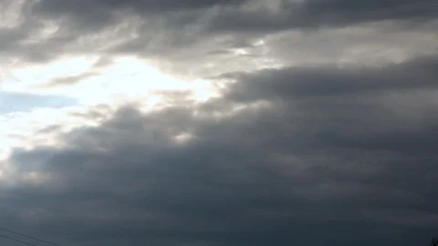 Beautiful beams sun, cloudscape with large, building clouds and sunrise Stock Footage 102559115