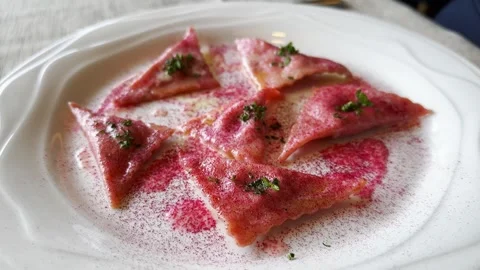 Beautiful Beetroot Ravioli on a White Plate Stock Footage 269378533
