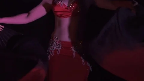 Beautiful belly dancer, night. Beautiful young woman belly dancer dancing bel Stock Footage