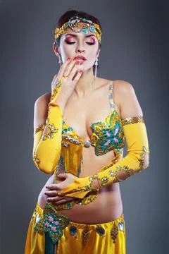 Beautiful belly dancer Stock Photos