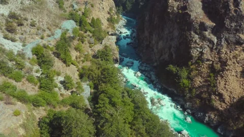 Beautiful Bhagirathi River flowing mid of two huge mountain rocks Stock Footage 145340570