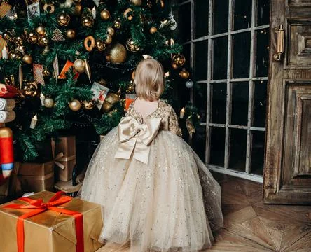 Beautiful big Christmas tree decorated with balls and toys holiday christmas Stock Photos