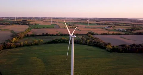 Beautiful big white windmill at sunset in the Midwest Video stock 167912218