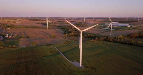Beautiful big white windmill at sunset in the Midwest Video stock 167912505