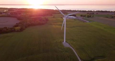 Beautiful big white windmill at sunset in the Midwest Video stock 167913721