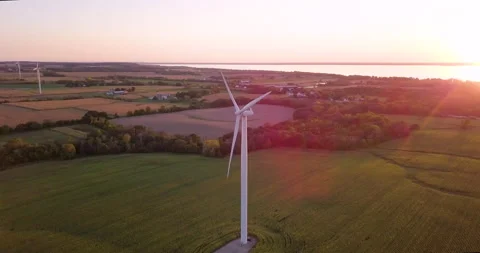 Beautiful big white windmill at sunset in the Midwest Stock Footage 167914082