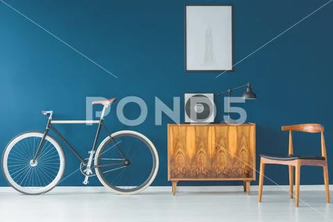 Beautiful bike on blue wall Stock Photos