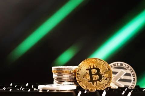 Beautiful bitcoin and stack of cryptocurrency coin on an abstract background Stock Photos