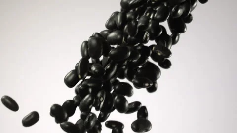 Beautiful black beans falling in slow motion Stock Footage 151041901