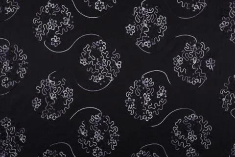Beautiful black fabric with light pattern and textile texture background Stock Photos