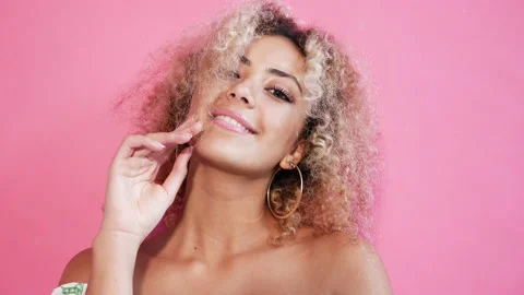 Beautiful black woman with afro blond hair Stock Footage