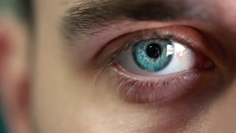 Beautiful blinking male eye close-up Stock Footage