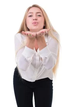 Beautiful blond business woman standing over white background with copy space Stock Photos