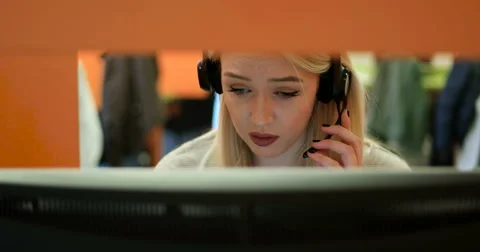 Beautiful blond help desk office support woman with headset Stock Footage 67259754