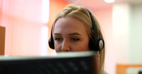 Beautiful blond help desk office support woman with headset Stock Footage 67299953