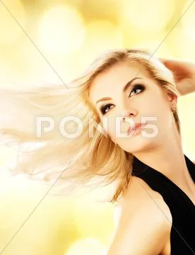 Beautiful blond woman over abstract golden background Stock Illustration
