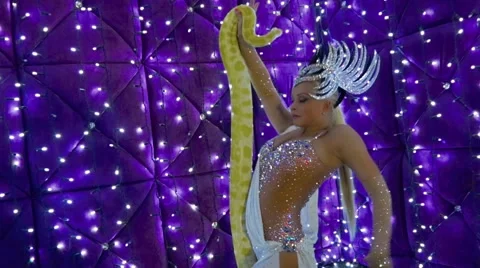 Beautiful blonde girl and python Stock Footage 61052083