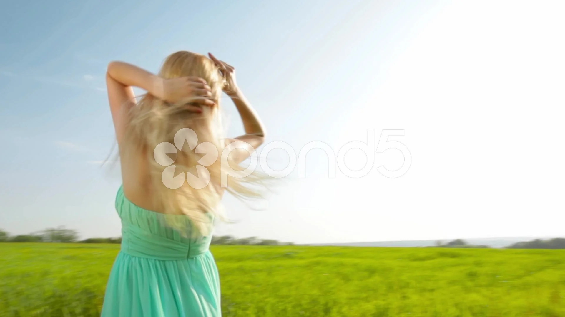 Beautiful blonde girl in dress dancing Stock Video Pond5