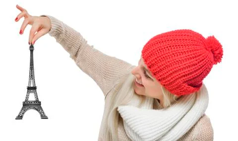 Beautiful blonde holding Eiffel Tower model. 스톡 사진