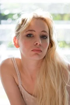 Beautiful blonde looking at camera Stock Photos
