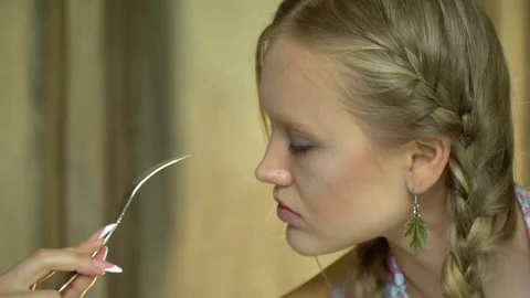 Beautiful blonde with a mysterious look Stock Footage