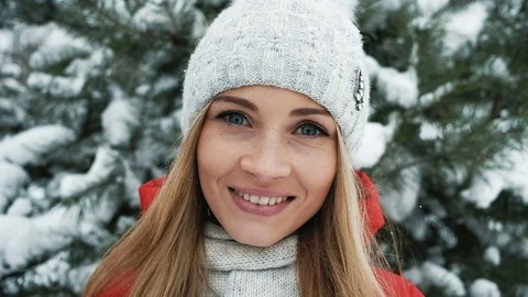 Beautiful blonde is smiling on background of winter landscape Stock Footage 70461806