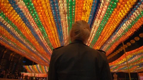 Beautiful blonde walking through temple in Seoul, South Korea. 60 fps Stock Footage 112892128