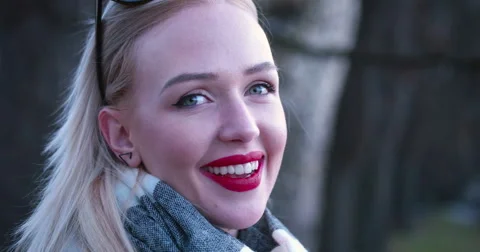 Beautiful blonde woman smiling to the camera Stock Footage 59415081