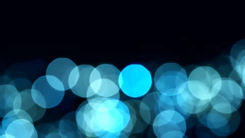 Beautiful blue abstract defocused background, glowing circle shape bokeh spots. 스톡 동영상 293363103