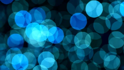 Beautiful blue abstract defocused background, glowing circle shape bokeh spots. 스톡 동영상 293363278