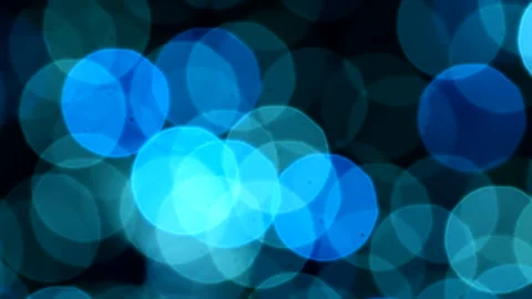 Beautiful blue abstract defocused background, glowing circle shape bokeh spots. 스톡 동영상 293363321