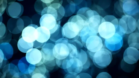 Beautiful blue abstract defocused background, glowing circle shape bokeh spots. 스톡 동영상 293363326