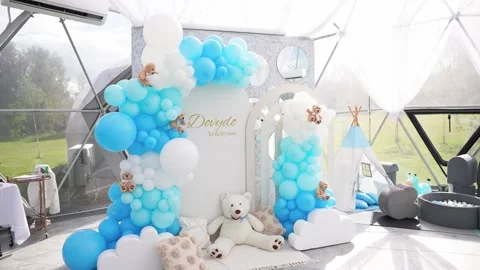 Beautiful blue and white baptism decoration setup for a baby boy inside a dome Stock Footage 319247232