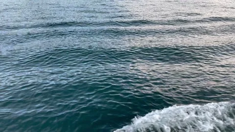 Beautiful blue calm waves in ocean on water surface Stock Footage 279150930