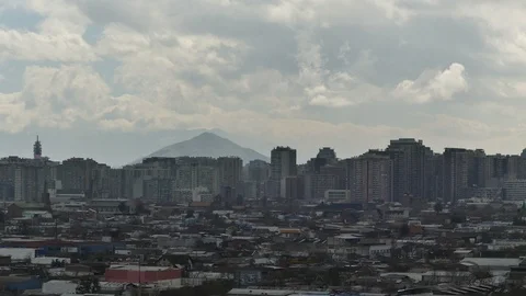 Beautiful blue, cloudy sky over downtown Santiago Stock Footage 94393579