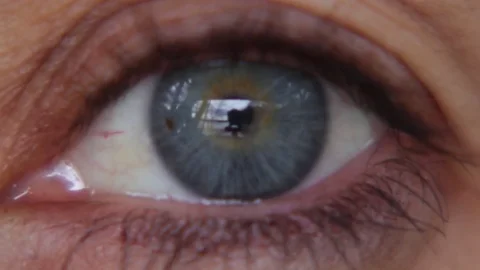 Beautiful blue eye close up Stock Footage 76165841