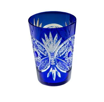Beautiful blue glass with an openwork pattern. Drinking glass. Isolated on .. Foto stock