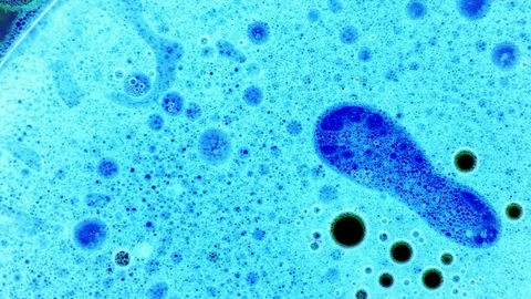 Beautiful blue liquid pattern with bubbles Stock Footage 125957292