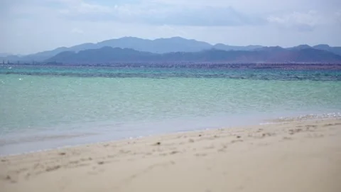 Beautiful blue mountains in the background of the sandy beach of the Red Sea 스톡 동영상 294892465