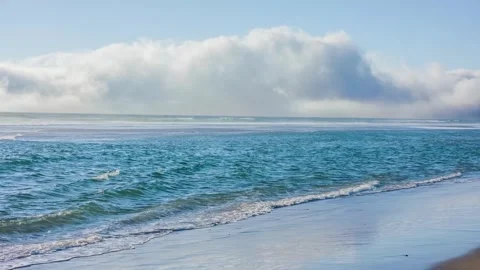 Beautiful Blue Ocean Waves Rolling onto a Sandy Oregon Coast Beach Stock Footage 326707613