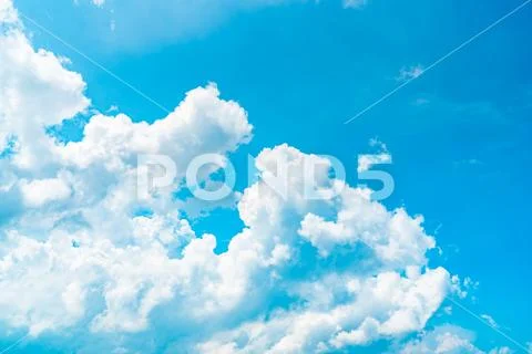 Beautiful blue sky and white cumulus clouds abstract background. Cloudscape b Stock Photos