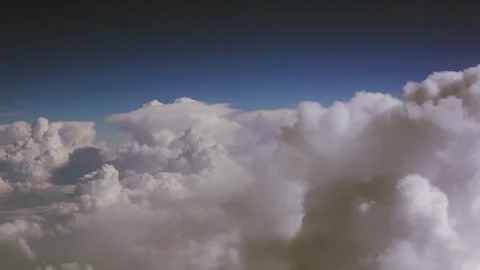 Beautiful blue sky background with clouds seen from commercial plane pilot ca Video stock 246702272