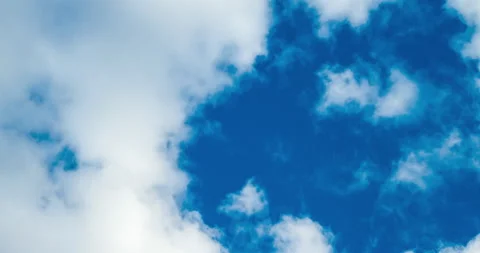 Beautiful blue sky with clouds background. Sky clouds. Loop 4K Time lapse Stock Footage 135111193